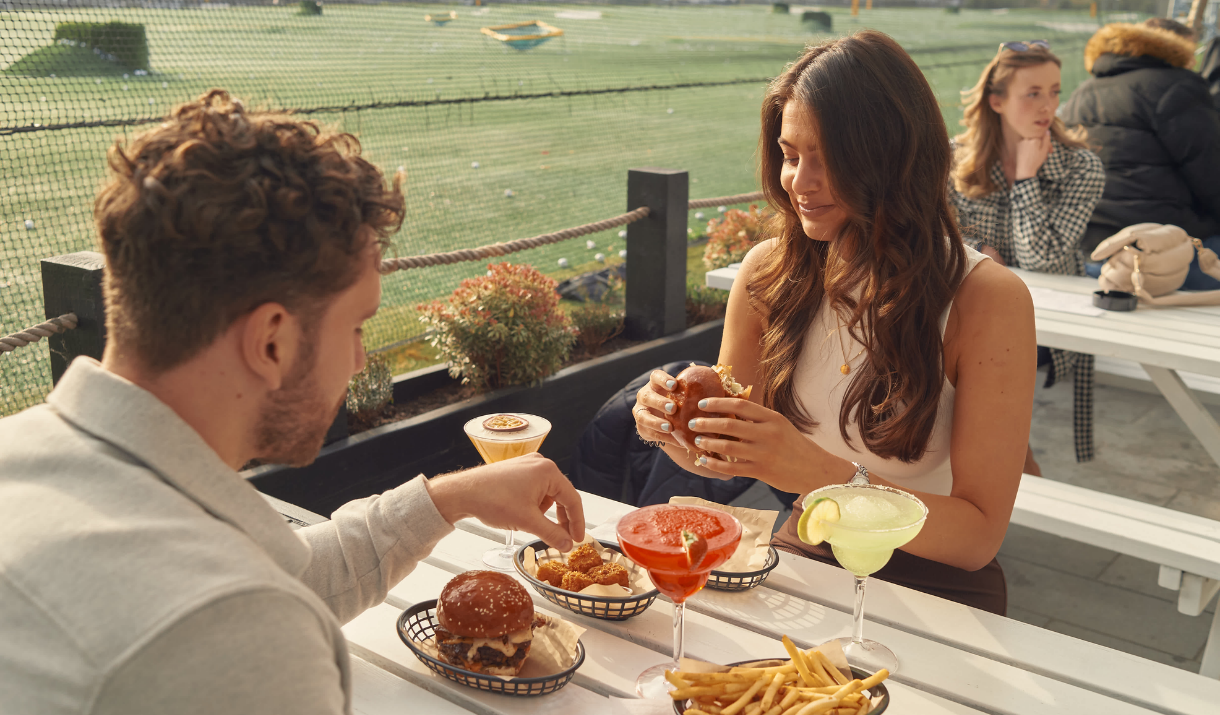 A couple eat at The Joint on Greenwich Peninsula